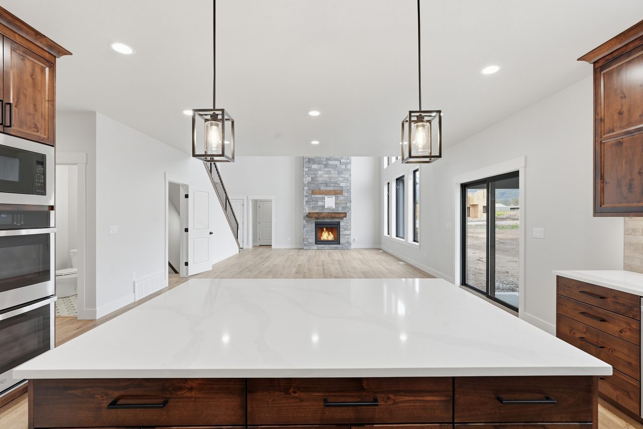 Custom kitchen with a wood beam ceiling built by Red Clover Homes in Cache Valley, Utah