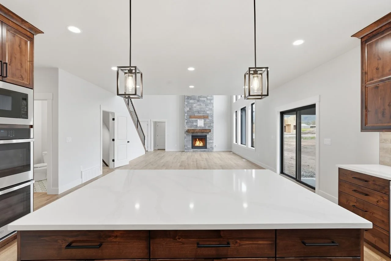 Custom kitchen with a wood beam ceiling built by Red Clover Homes in Cache Valley, Utah